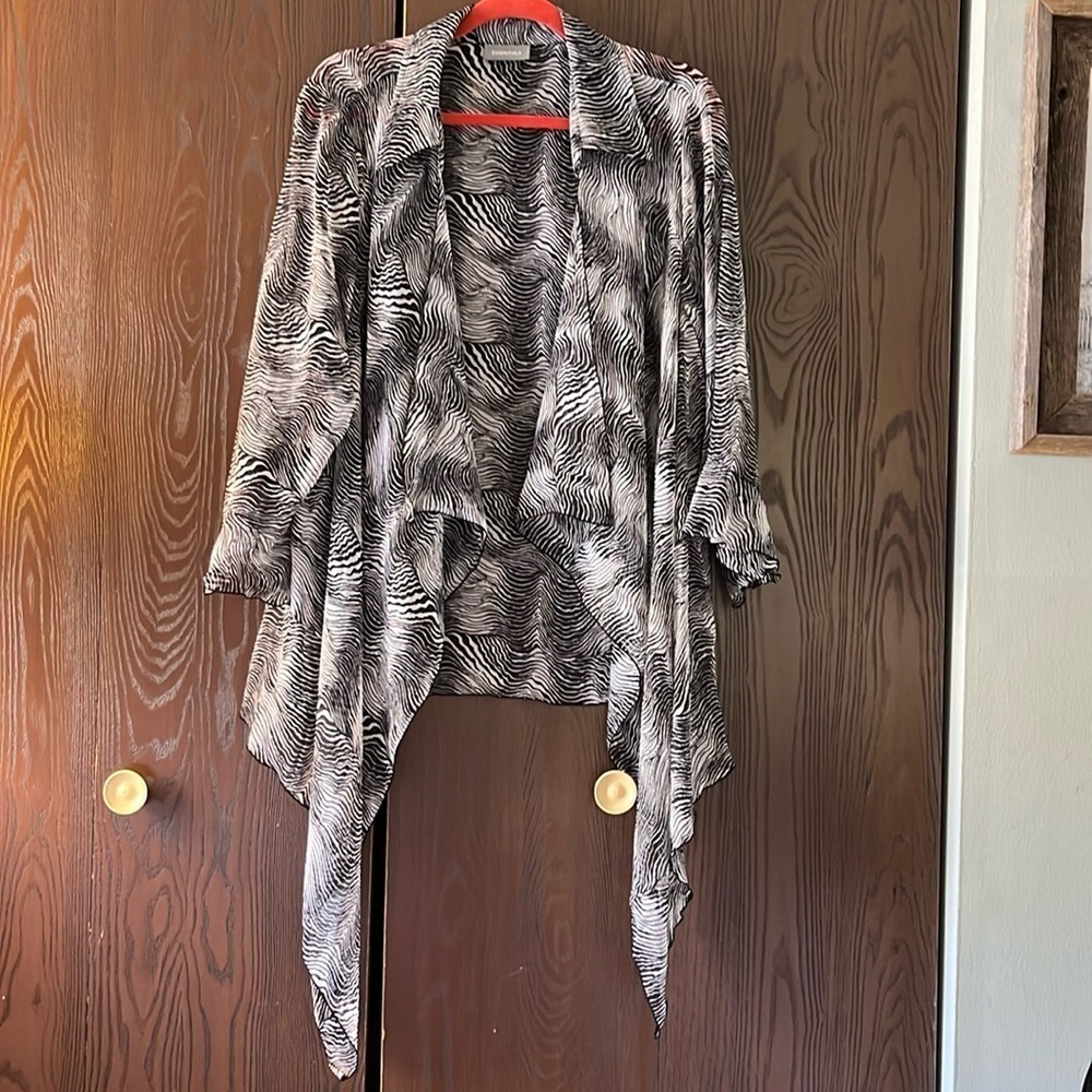 Essential black and white sheer sleeved shrug. Size Large.
